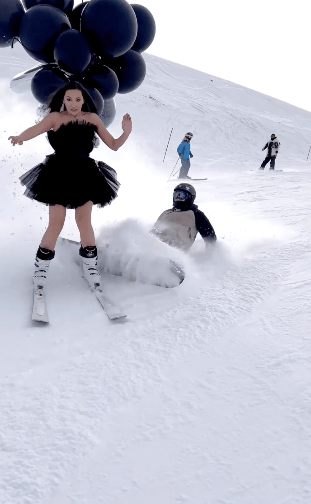 Watch This Mountain Collision: Snowboarder Takes Down Elegantly Dressed Skier